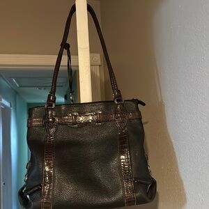 Authentic,used Brighton handbag, black with brown trim with silver hardware.